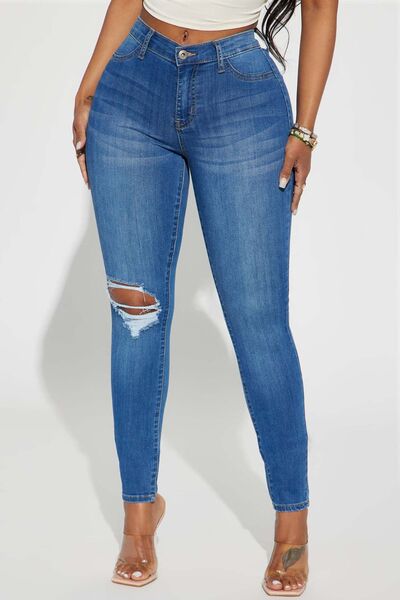 Distressed Buttoned Jeans